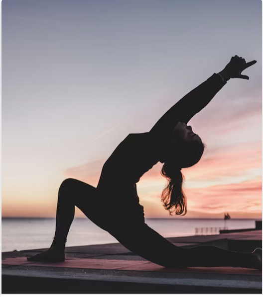 Person practicing yoga